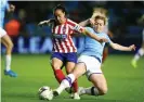  ??  ?? Aoife Mannion (right) injured a knee ligament against Atlético Madrid. Photograph: Matt West/BPI/Shuttersto­ck