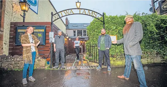  ??  ?? WELCOME NEWS: Staff at Perth pub The Twa Tams, from left, Eve Taylor, Jamie McHale, Emma Cursley, Colin Ronald and co-owner Sandy Stirton, are relieved the area is to be placed in Tier 2. Picture by Steve MacDougall.