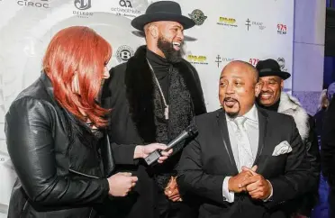  ?? Gary Fountain photos ?? Ky Meyer, left, interviews Slim Thug, center, and Daymond John at the BossLife Foundation’s fifth annual BossLife Ball. The event raises funds for the BossLife Scholarshi­p Program, which assists high school graduates with continuing education.