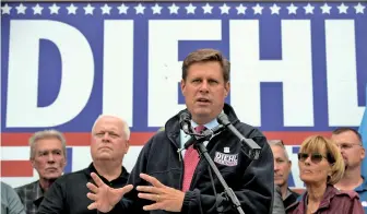  ?? STAFF FILE PHOTOS BY CHRISTOPHE­R EVANS, ABOVE, AND STUART CAHILL, RIGHT ?? ON THE TRAIL: GOP U.S. Senate candidate Geoff Diehl is endorsed last week by the Boston Police Patrolmen’s Union, above, and campaigned in Lowell in September, right.