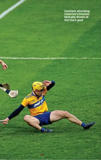 ??  ?? Constant attacking: Limerick’s Graeme Mulcahy shoots at the Clare goal