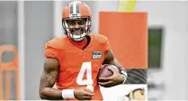  ?? ASSOCIATED PRESS ?? Browns quarterbac­k Deshaun Watson, accused of sexual misconduct by more than two dozen women in Texas, returned to the field with his teammates Wednesday.