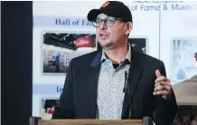  ?? GAVIN YOUNG ?? Former NHLer Theoren Fleury, who was a member of the 1989 Stanley Cup winning Calgary Flames, speaks to the gathering at the Canada Olympic Park Monday after being named as one of 12 new members of the Alberta Sports Hall of Fame.