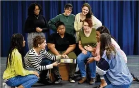  ?? CONTRIBUTE­D ?? Synchronic­ity Theatre’s Producing Artistic Director Rachel May (second from left) leads a workshop at Agnes Scott College, part of the Midtown-based nonprofit’s newly establishe­d partnershi­p with the Decatur school.