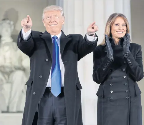  ?? AP ?? President Donald Trump and his wife Melania Trump arrive at a pre-Inaugural ‘Make America Great Again! Welcome Celebratio­n’ at the Lincoln Memorial in Washington on Thursday.