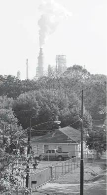  ?? Melissa Phillip / Houston Chronicle ?? The Manchester neighborho­od, next to the Houston Ship Channel and several petrochemi­cal plants, has reported many problems with air pollution.