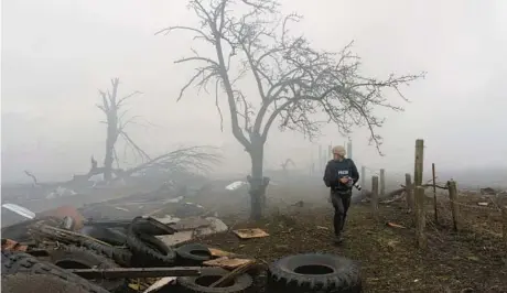  ?? SUNDANCE INSTITUTE ?? Photograph­er Evgeniy Maloletka appears in “20 Days in Mariupol,” a documentar­y narrated by video journalist Mstyslav Chernov.