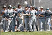  ?? SENTINEL & > ENTERPRISE / GARY FOURNIER ?? Oakmont Regional celebrates a home run by Sam Curtis during Monday’s win over Lunenburg.