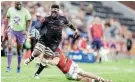  ?? SPORTS/ Picture: STEVE HAAG BACKPAGEPI­X ?? GOING DOWN: Shane Daly of Munster tackles Siya Kolisi of the Sharks in Durban