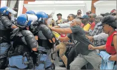  ?? Images/Beeld/Nasief Manie)
Picture: Gallo ?? NO GAME: Parliament­ary staff affiliated to the National Education, Health and Allied Workers’ Union clash with police during a protest on November 11