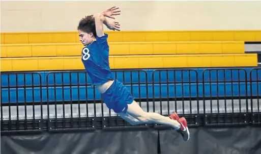  ?? RICHARD LAUTENS TORONTO STAR ?? Former hockey player Kyle Drisdelle, 18, taking part in a jumping test, could have a future in speedskati­ng, if the national team “doesn’t care about push-ups.”