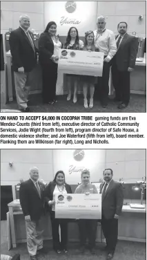  ??  ?? ON HAND TO ACCEPT $4,000 IN COCOPAH TRIBE gaming funds are Eva Mendez-Counts (third from left), executive director of Catholic Community Services, Jodie Wight (fourth from left), program director of Safe House, a domestic violence shelter; and Joe...