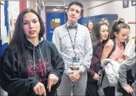  ?? CP PHOTO ?? Mi’kmaq activist Rebecca Moore talks with reporters at Halifax Central Junior High, formerly known as Cornwallis Junior High, as Robert MacMillan, principal, looks on, in Halifax on Wednesday. Moore addressed the student population during morning...