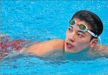  ?? XINHUA ?? Olympic champion swimmer Wang Shun, 27, and sharpshoot­er Pang Wei, 35, both maintained their terrific form from Tokyo 2020 by bagging gold medals at the National Games in Xi’an.