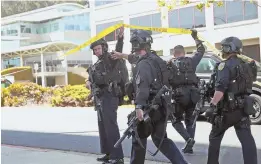  ??  ?? SECURITY CHECK: Police respond to an active shooter situation at the YouTube facility in San Bruno, Calif., yesterday. An employee is patted down.