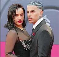  ?? RONDA CHURCHILL/AFP VIA GETTY IMAGES/TNS ?? Rauw Alejandro and Rosalia arrive for the 23rd Annual Latin Grammy awards on Nov. 17, 2022, in Las Vegas, Nevada.