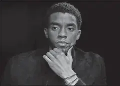  ?? The Associated Press ?? ORIGIN STORY: Actor Chadwick Boseman appears at an interview for the film "Marshall," in Washington, on Sept. 21. Boseman plays Thurgood Marshall, the first African-American Supreme Court Justice, as a young attorney for the NAACP as he battles through...