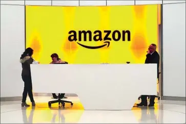  ?? Mark Lennihan Associated Press ?? AMAZON WEB SERVICES was the front-runner, but favoritism allegation­s have hampered its bid.