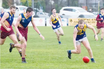  ??  ?? Lachlan Hedrick booted three goals for Ellinbank to claim best afield honours during the under 18 match against Warragul Industrial­s; Photograph­s: Michael Robinson.