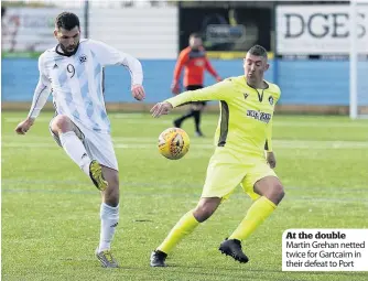  ??  ?? At the double Martin Grehan netted twice for Gartcairn in their defeat to Port