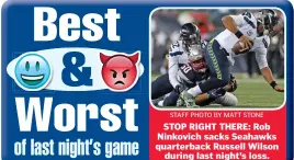  ?? STAFF PHOTO BY MATT STONE ?? STOP RIGHT THERE: Rob Ninkovich sacks Seahawks quarterbac­k Russell Wilson during last night’s loss.