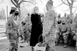  ?? JACQUELYN MARTIN/AP ?? First lady Jill Biden meets with and thanks National Guard members for helping protect her family Friday outside the U.S. Capitol in Washington, D.C.