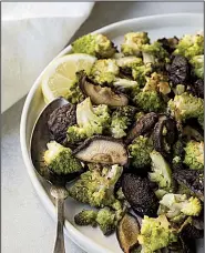  ?? AP/Sarah Crowder ?? Roasted Broccoflow­er and Shiitake Mushrooms With Rosemary and Garlic