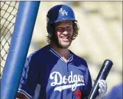  ?? Associated Press ?? Dodgers starting pitcher Clayton Kershaw smiles during Thursday workouts before the NLDS, which begins today at 6:30 p.m. against the New York Mets in Los Angeles.