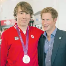  ?? T H E C A NA D I A N P R E SS/ F I L E S ?? Canadian rower Malcolm Howard, who won silver at the London Olympics in 2012, is pictured with Prince Harry.
