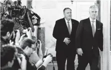  ??  ?? Secretary of State Mike Pompeo, left, and National Security Adviser Robert O'Brien urged a tough response after rocket attacks that killed two U.S. troops in Baghdad.