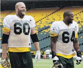  ?? DAVID BLOOM ?? Justin Sorensen, left, and D’Anthony Batiste are two members of a makeshift O-line for the Esks heading into Friday’s game.
