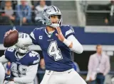  ?? ASSOCIATED PRESS FILE PHOTO ?? Cowboys quarterbac­k Dak Prescott signed his $31.4 million tender under the franchise tag. That would be the richest one-year contract in franchise history.