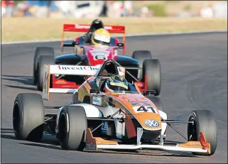  ?? Picture: TONY ALVES ?? PUSHING HARD: Formula Volkswagen series leader Robert Wolk keeps ahead of Werner Scholtz during the National Super Series fourth round in Zwartkops. Wolk will be looking to add an eighth win out of nine races this year to his name tomorrow at the EL...
