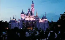  ?? Picture: MARIO ANZUONI/REUTERS ?? EXPANDING KINGDOM: Sleeping Beauty Castle is pictured at dusk at Disneyland Park in Anaheim, California. The park is expected to expand soon