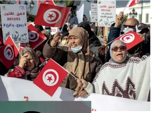  ??  ?? THE LEGACY OF STRONGMEN Top: A demonstrat­ion in Tunisia on December 10, 2020, for victims of human rights violations in the country.