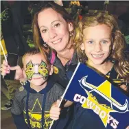  ?? Brontie Regazzoli and children Heath, 5, and Paige, 6, of Mt Low watched the game at Cowboys Leagues Club. ??