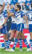  ?? ?? High-fives for two-try hero Josh Addo-Carr.
