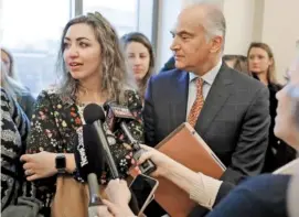  ?? AP PHOTO/MARK HUMPHREY ?? RaDonda Vaught, left, and her attorney, Peter Strianse, talk with reporters after a court hearing in 2019 in Nashville.