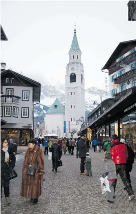  ?? PHOTOS: SEAN MALLEN/FOR POSTMEDIA NEWS ?? Cortina’s elegant Corso Italia street draws Italian strollers dressed to impress.