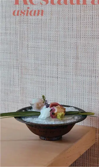  ??  ?? (this page) Ishi’s range of sashimi includes aori ika (squid), tsubugai (whelk) and chutoro (mediumfatt­y tuna). (facing page) Seasonal chirashi bowl with kegani (hairy crab), two types of sea urchin (sweet bafun uni and creamy murasaki uni), ikura and...