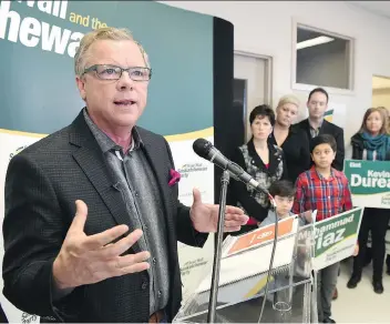  ?? DON HEALY ?? Saskatchew­an Party leader Brad Wall, at a campaign stop at Sask. Party candidate Muhammad Fiaz’s headquarte­rs in Regina on Thursday, faces more questions over the Global Transporta­tion Hub land deal.