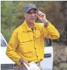  ??  ?? John Morlock, safety officer for Division Union, checks on a burn area in the Museum Fire on Thursday in Flagstaff.