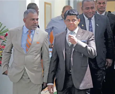  ?? PARLIAMENT OF FIJI. ?? Acting Prime Minister and Attorney-General Aiyaz Sayed-Khaiyum, right, and Minister For Industry, Trade, Tourism , Lands and Mineral Resources Faiyaz Koya during a break in the parliament­ary session . Photo: