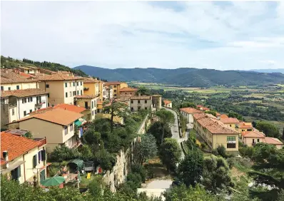  ?? Anne D’Innocenzio via AP ?? ■ This Sept. 10 photo shows a view from the top of the medieval hill town Cortona in the province of Arezzo in the Tuscany region of Italy.