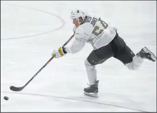  ?? Erik Verduzco Las Vegas Review-Journal @Erik_Verduzco ?? Center Ben Jones takes a shot during the Golden Knights’ developmen­t camp Wednesday at City National Arena. He is expected to play for the Chicago Wolves next season in the AHL.