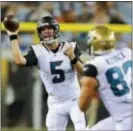  ?? STEPHEN B. MORTON — THE ASSOCIATED PRESS ?? Jaguars quarterbac­k Blake Bortles (5) throws a pass to tight end Ben Koyack (83) Thursday in Jacksonvil­le, Fla.