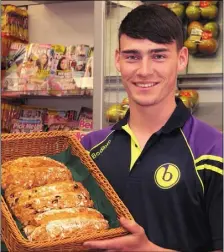  ??  ?? Robbie Brooks, son of owners Paul and Orla Brooks, at Brooks Supermarke­t, Riverchape­l.