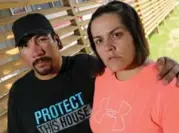 ?? LARS HAGBERG FOR THE TORONTO STAR ?? Cheryl Hookimaw and her husband, Xavier, filed a $1.5-million lawsuit over allegation­s of harassment by a veteran OPP officer in their James Bay community of Moosonee.