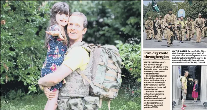  ??  ?? ON THE MARCH: Barefoot Soldier Major Chris Brannigan with daughter Hasti, left. She joined him at 10 Downing Street to hand in a letter calling for the NHS to improve its approach in dealing with those with rare diseases (Picture from The Daily Express).