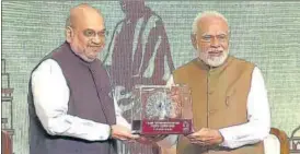  ?? ANI ?? Prime Minister Narendra Modi being felicitate­d by Union minister Amit Shah at the third edition of 'No Money For Terror' Ministeria­l Conference, in New Delhi on Friday.